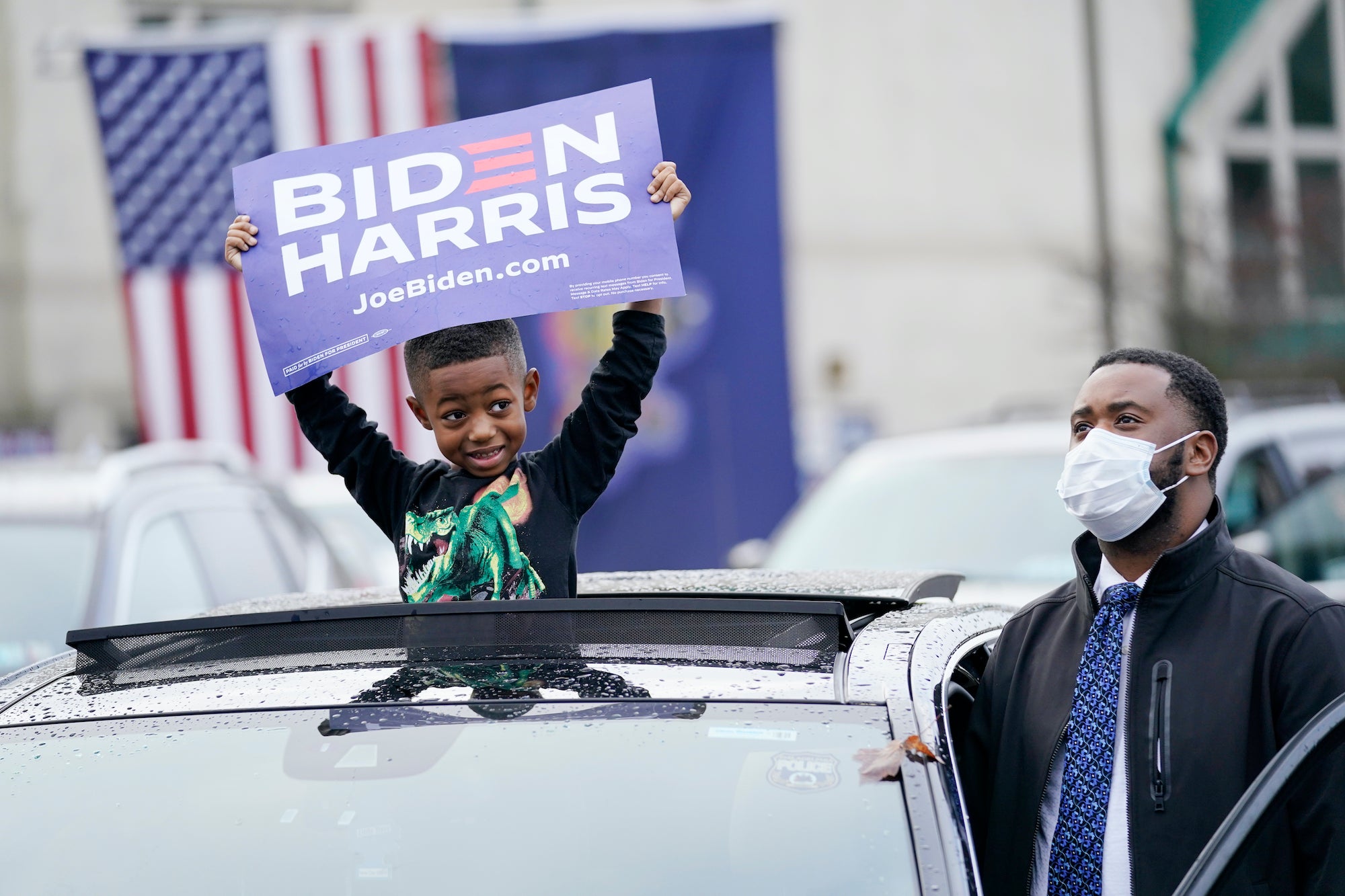 Supporters attend a “Souls to the Polls” drive-in rally for Democratic presidential candidate former Vice President Joe Biden, at Sharon Baptist Church