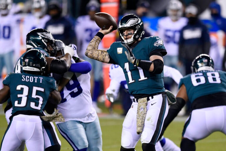 Philadelphia Eagles' Carson Wentz passes during the first half