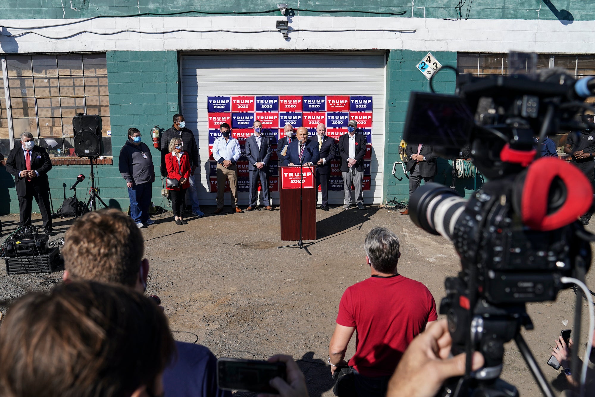 Former New York mayor Rudy Giuliani, a lawyer for President Donald Trump, speaks during a news conference at Four Seasons Total Landscaping on legal challenges to vote counting in Pennsylvania.