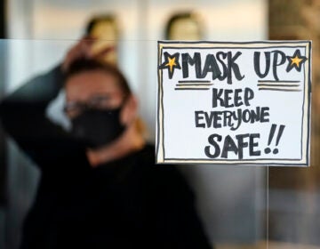 A sign reminds patrons to mask up while inside a Pennsylvania restaurant.