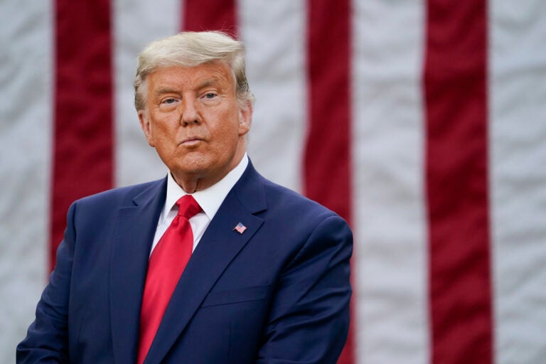 President Donald Trump listens during an event on Operation Warp Speed