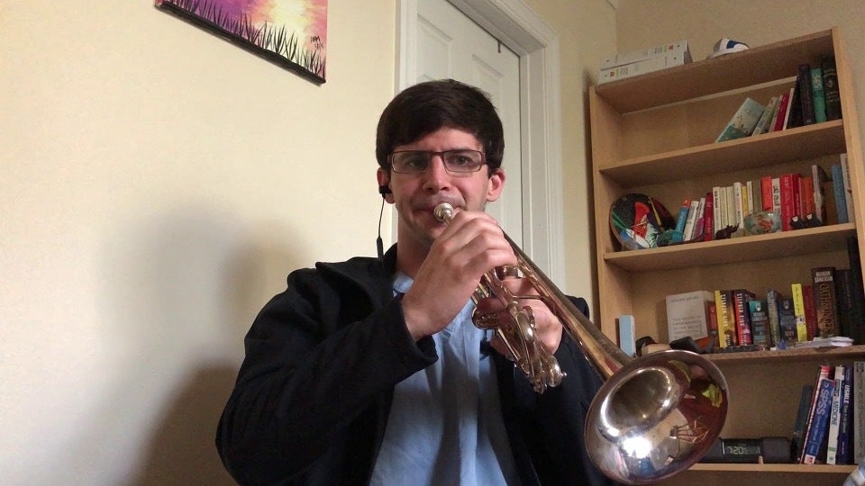 Alex Morrison plays the trumpet
