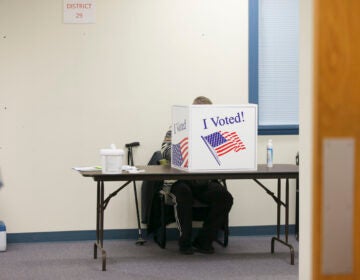 A voter fills out their ballot in Cherry Hill, N.J. on Nov. 3, 2020. (Miguel Martinez for WHYY)