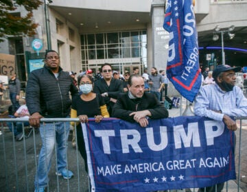 Trump supporters  outside the Convention Center after Joe Biden is projected to be the winner of the 2020 presidential election. (Miguel Martinez for WHYY)