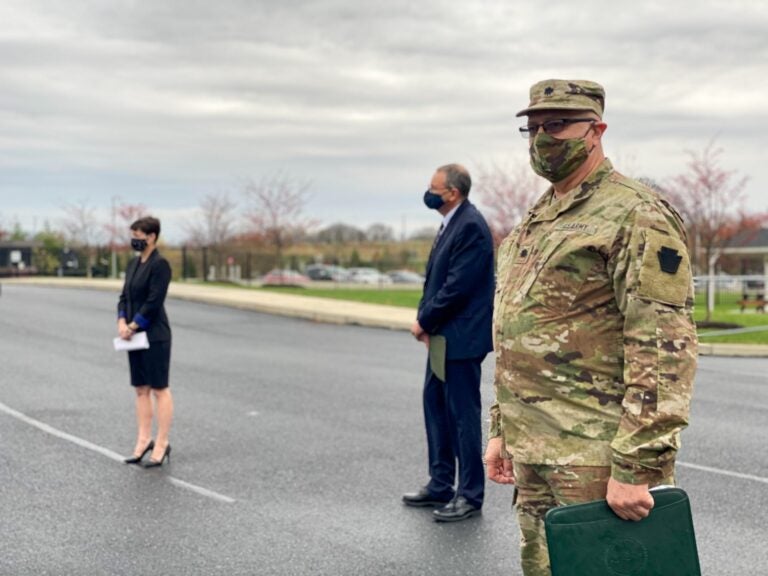 
Lieutenant Col. Albert Fogle, at right, glances at the camera while attending a press conference Thur., Nov. 12, 2020. Behind him are Pennsylvania Emergency Management Agency Director David 