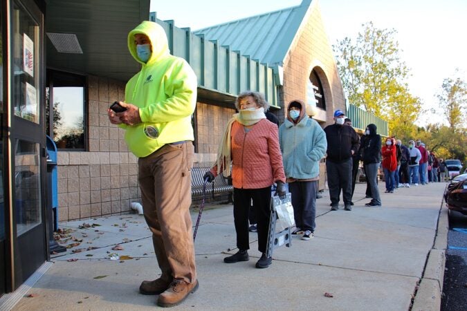 Voters wait in line at Brookhaven Municipal Center in Delaware Country, Pa.