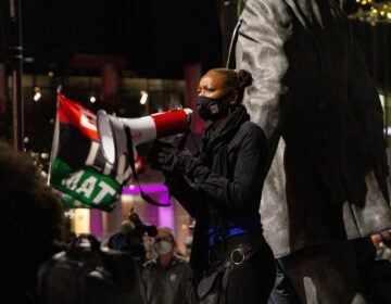 YahNé Ndgo leads protesters in chanting Walter Wallace’s name at City Hall after the city of Philadelphia released body cam footage of the shooting of Walter Wallace Jr. (Kimberly Paynter/WHYY)