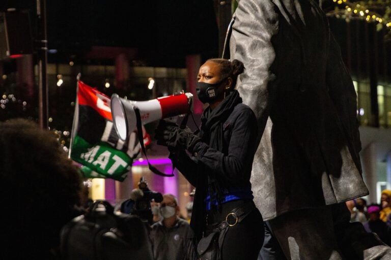 YahNé Ndgo leads protesters in chanting Walter Wallace’s name at City Hall after the city of Philadelphia released body cam footage of the shooting of Walter Wallace Jr. (Kimberly Paynter/WHYY)