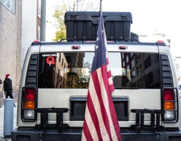 Philadelphia police say they are investigating an alleged plot to attack the Pennsylvania Convention Center in Philadelphia connected to a Hummer parked nearby. (Kimberly Paynter/WHYY)