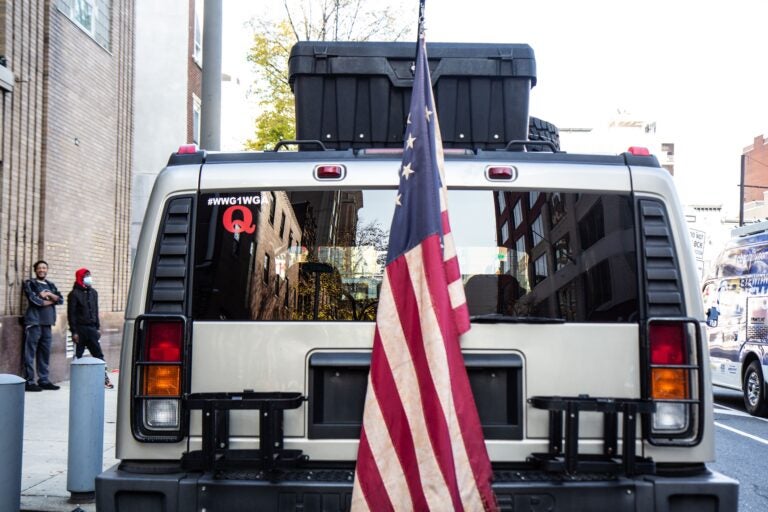 Philadelphia police say they are investigating an alleged plot to attack the Pennsylvania Convention Center in Philadelphia connected to a Hummer parked nearby. (Kimberly Paynter/WHYY)