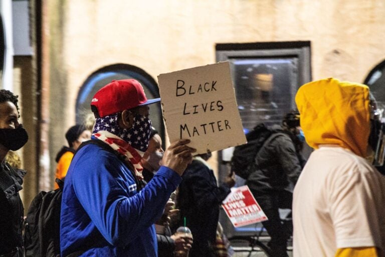 Protesters marched in Old City in honor of Walter Wallace Jr. after the release of officer body cam footage showing his fatal shooting. (Kimberly Paynter/WHYY)