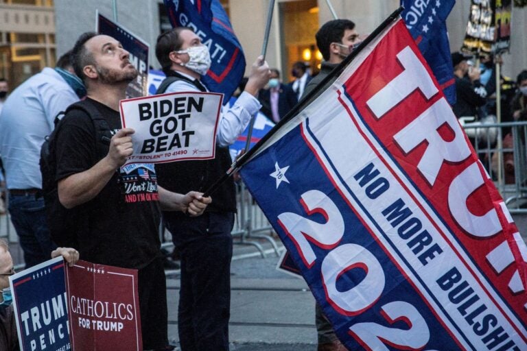 About two dozen protesters gathered outside Philadelphia's vote counting headquarters in support of President Trump. (Kimberly Paynter/WHYY