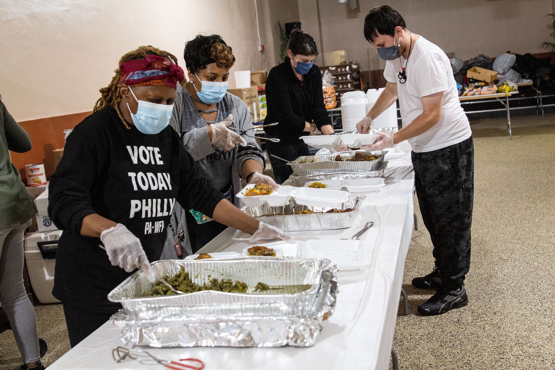 Volunteers at the Chosen 300 Ministries prepare meals for those in need on Spring Garden Street.