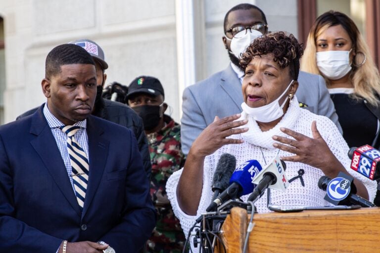 Shaka Johnson, attorney for the Wallace family, (left) and Gwen Carr (right), mother of Eric Garner, spoke in support of the Wallace family and Wallace’s mother who is bedridden with grief. (Kimberly Paynter/WHYY)