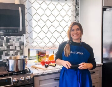 Mrs. Mylonas making stuffed baby eggplant