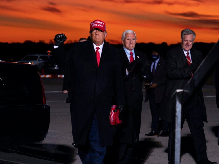 Mark Meadows, right, traveled with President Trump and Vice President Pence in the homestretch of the campaign, including to a rally in Traverse City, Mich. on Nov. 2.