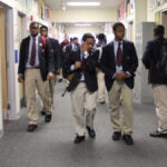 Students at Boys' Latin of Philadelphia Charter School are shown in 2013. Boys' Latin is one of 21 charter schools in the city that joined the coalition. (Emma Lee/WHYY) 