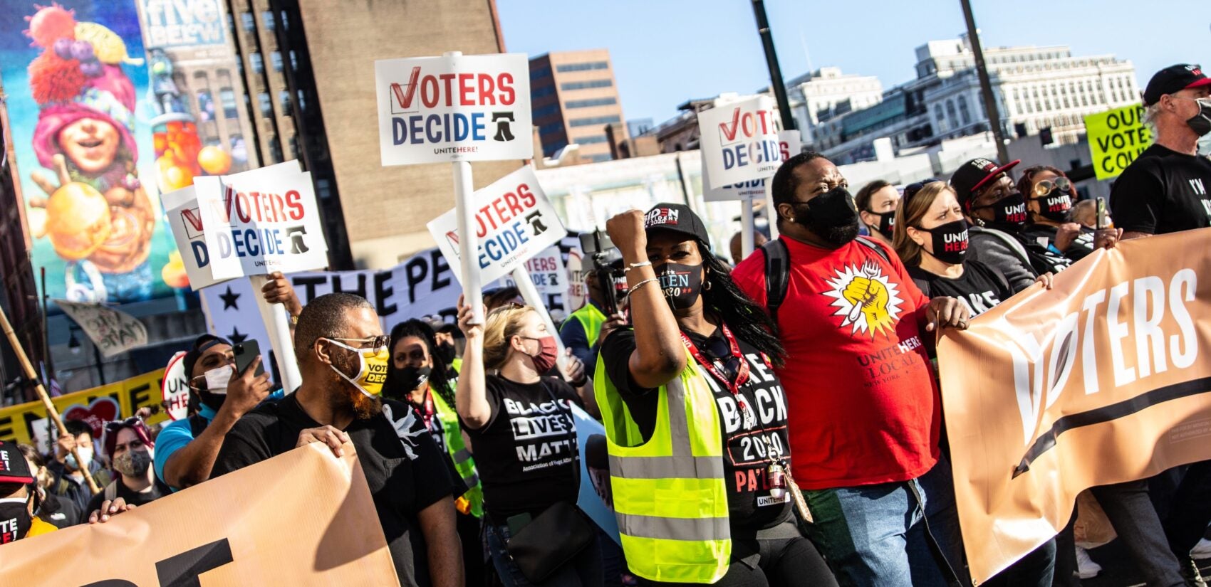 Demonstrators march through Center City Philadelphia to celebrate a Biden win.