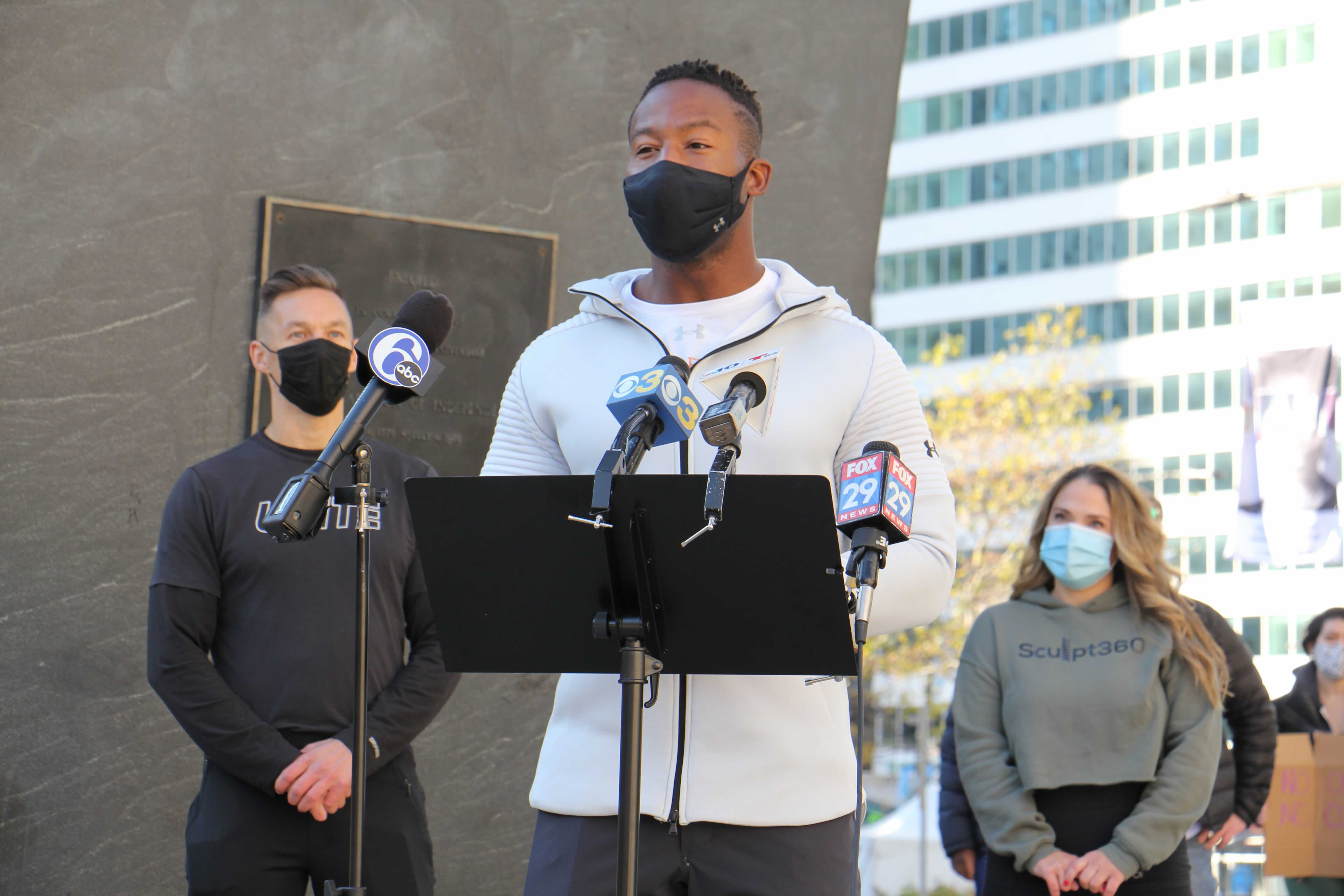 Philadelphia gym owners (from left) Gavin McKay, Osayi Osunde and Stephanie Luongo speak at a press conference