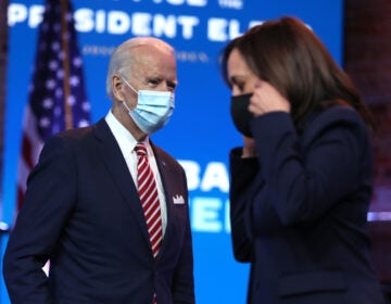 President-elect Joe Biden walks by Vice President-elect Kamala Harris