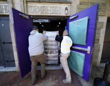 Chester County, Pa., workers transport mail-in and absentee ballots to be processed at West Chester University, Wednesday, Nov. 4, 2020, in West Chester. (Matt Slocum/AP Photo)