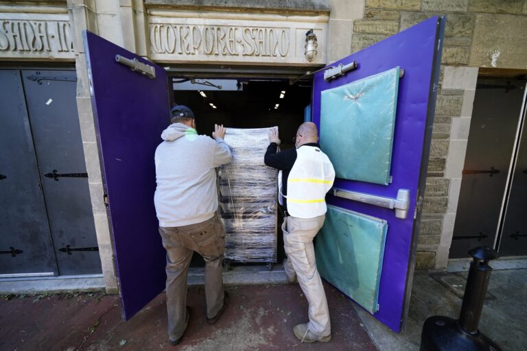 Chester County, Pa., workers transport mail-in and absentee ballots to be processed at West Chester University, Wednesday, Nov. 4, 2020, in West Chester. (Matt Slocum/AP Photo)