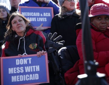 Health care activists rally in front of the U.S. Capitol