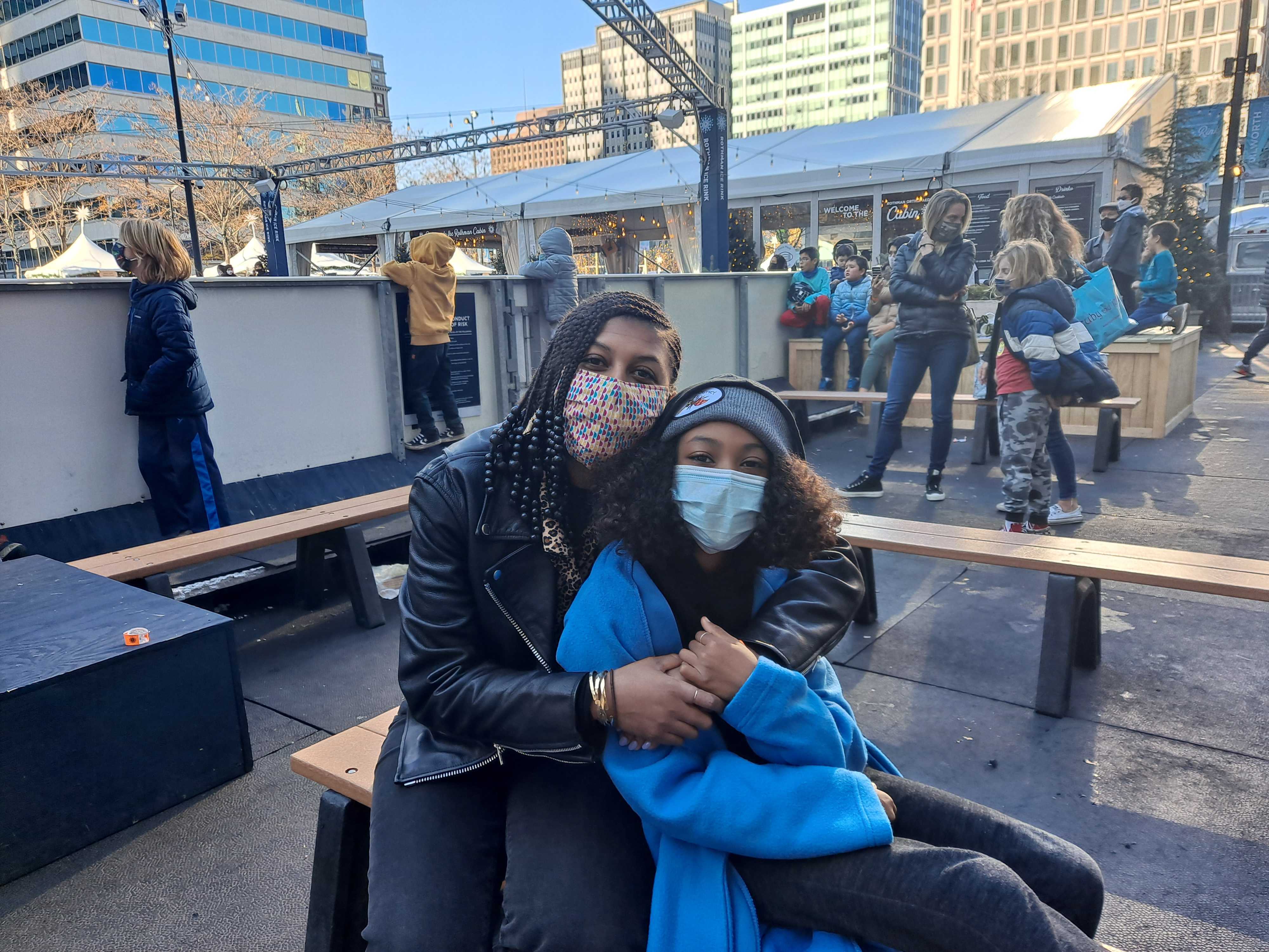 Shanti Mayers (left) and her 10-year-old daughter Jolie Abraha skated and browsed the Christmas Village