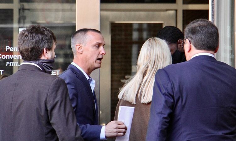 Trump operatives Pam Biondi and Corey Lewandowski arrive at Pennsylvania Convention Center, where Philadelphia votes are being counted, armed with what appears to be a court order.