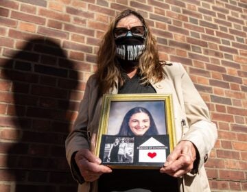 Elise Schiller holds a photo of her daughter Giana Natali