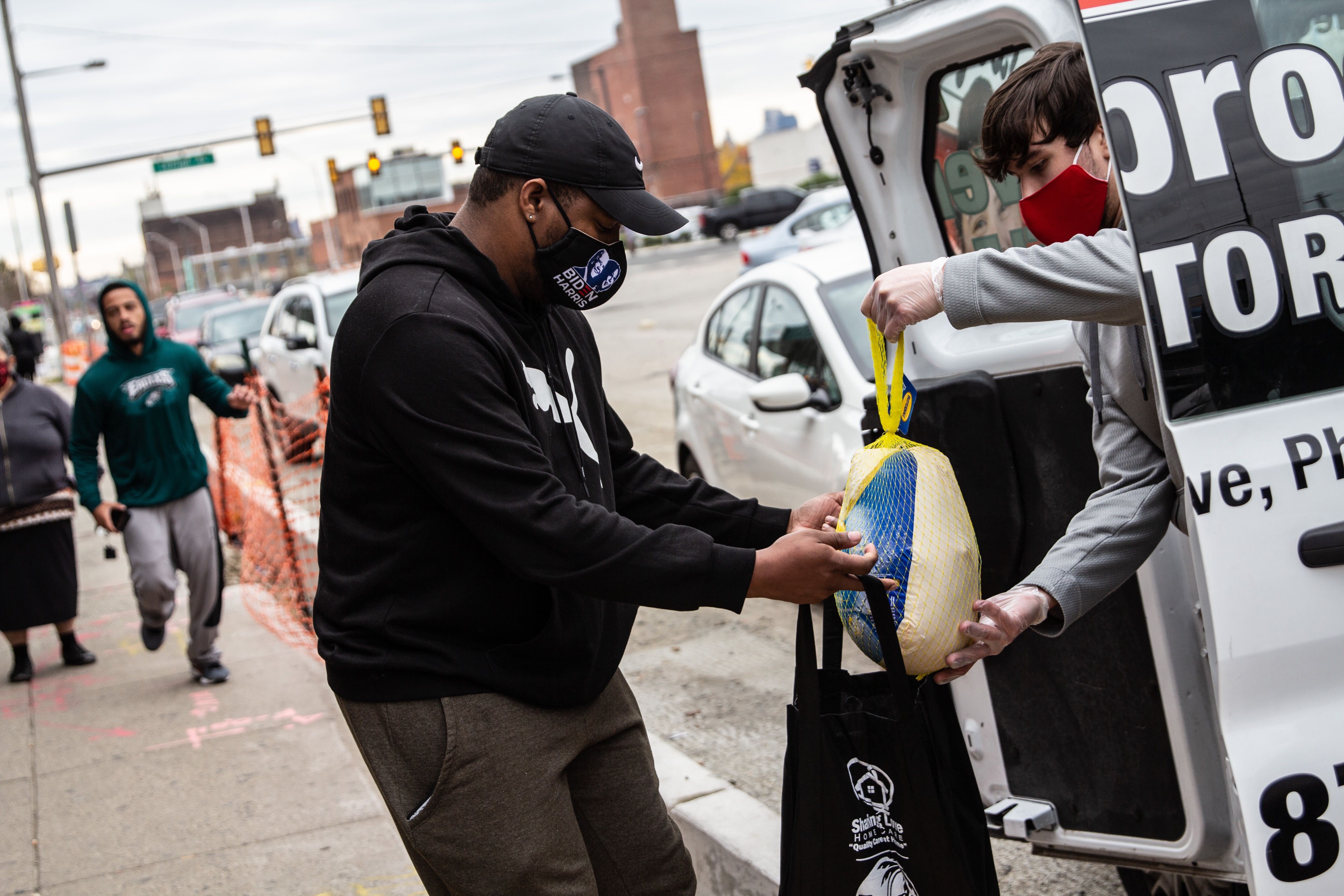 Wayne Rollins receives a free turkey in Kensington.