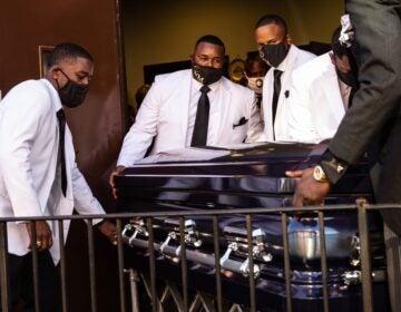 Walter Wallace Jr.’s casket is moved out of New Temple Baptist Church in North Philadelphia.