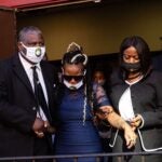 Dominique Wallace (center) leaves the funeral of her late husband, Walter Wallace Jr.