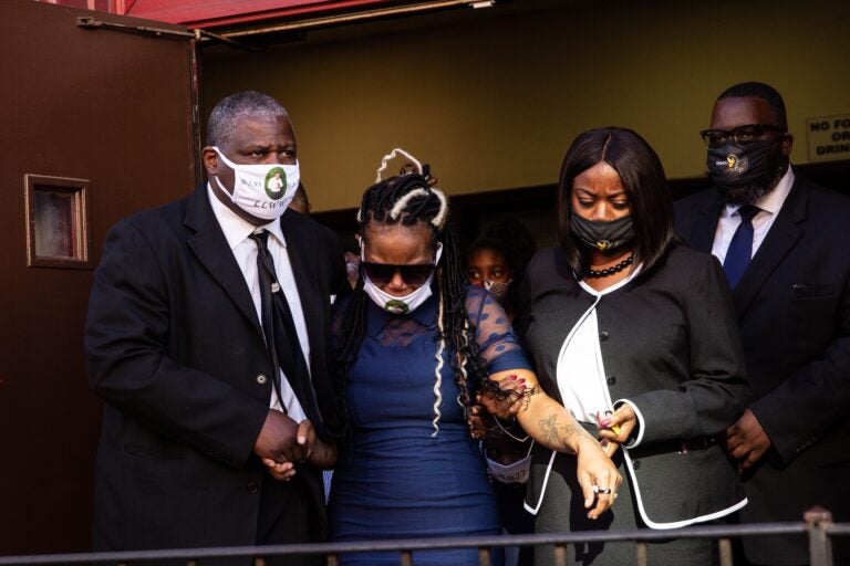 Dominique Wallace (center) leaves the funeral of her late husband, Walter Wallace Jr.