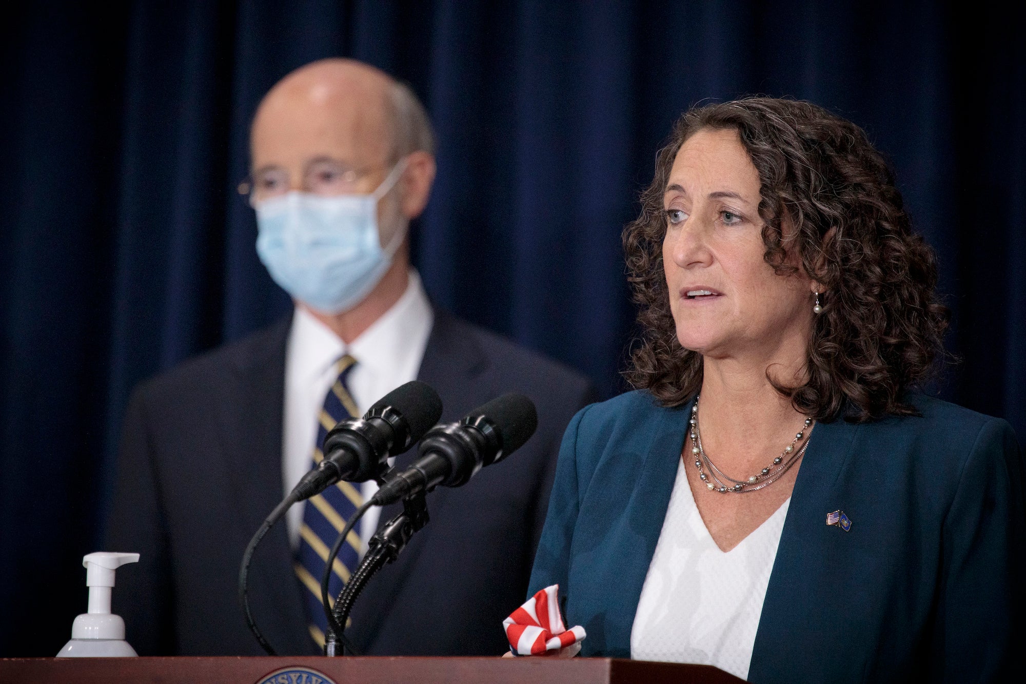 Secretary of State Kathy Boockvar (right) and Gov. Tom Wolf (left) answer questions from the press in Harrisburg.