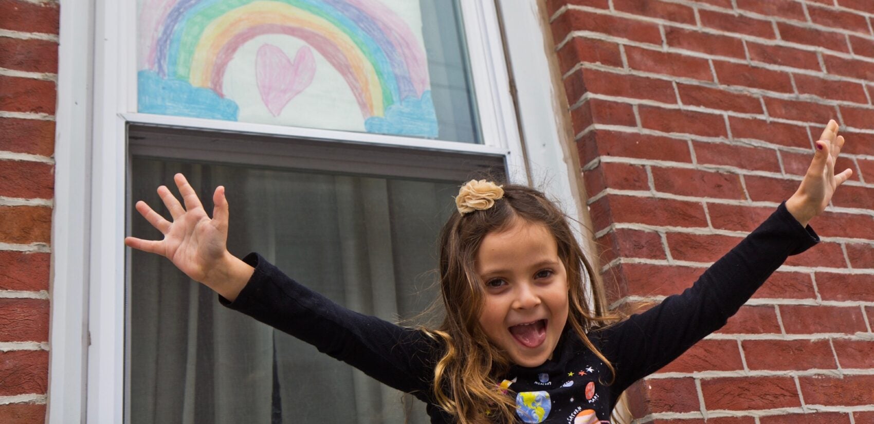 Bowie Moon Porter drew this rainbow for other kids on the rainbow hunt through Fishtown. (Kimberly Paynter/WHYY)