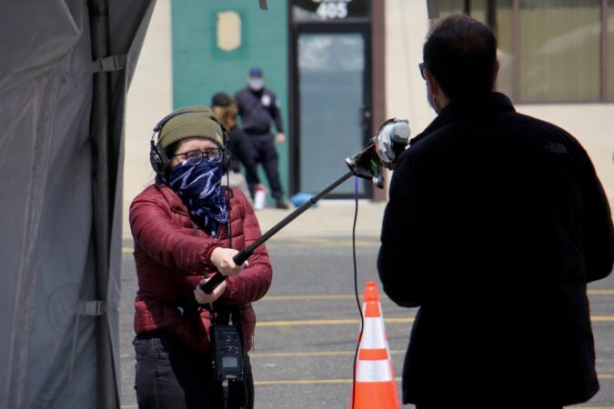 Ximena Conde covers the opening of a COVID-19 testing site in Camden, New Jersey. (Emma Lee/WHYY)