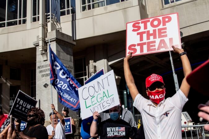 Protesters dueled outside the Pennsylvania Convention Center in Philadelphia, each side accusing the other of stealing the election. (Kimberly Paynter/WHYY)