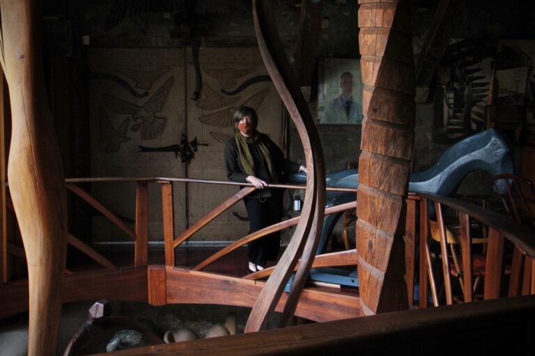 Julie Siglin looks at the sculptures displayed in Wharton Esherick's home studio