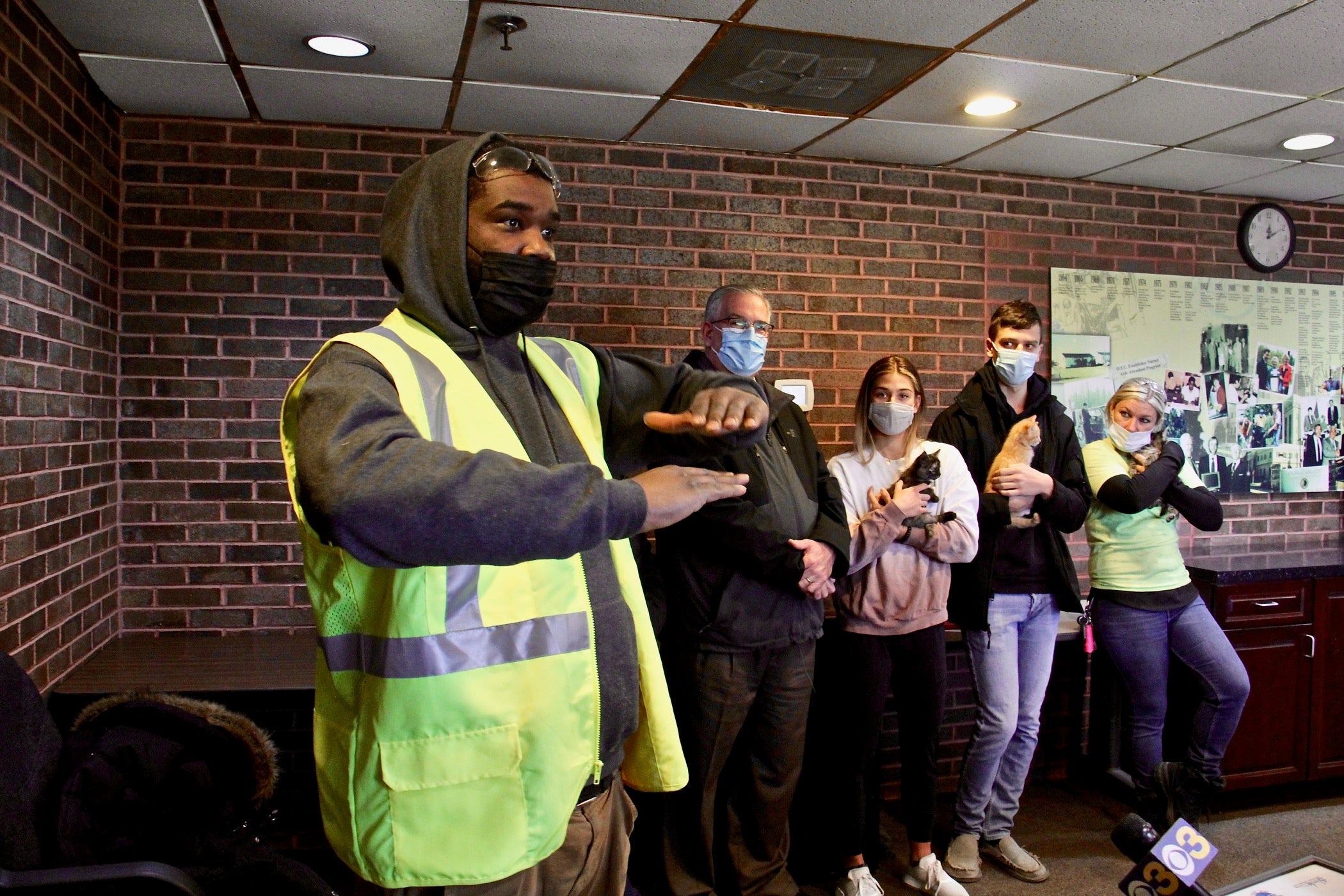 Barrie Donaldson (left) an employee at the Burlington County recycling plant in Westampton, describes how he rescued three kittens after he noticed that a backpack on the conveyor belt he was monitoring was moving.