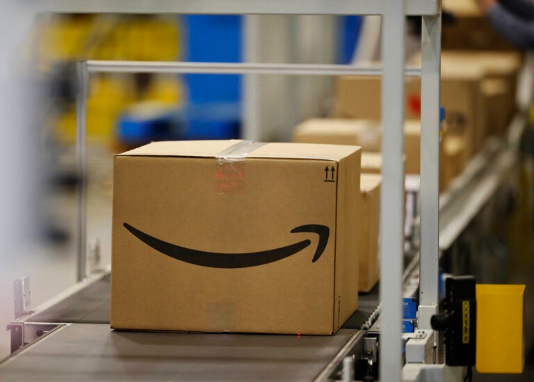 Boxes on a conveyor belt at an Amazon fulfillment center