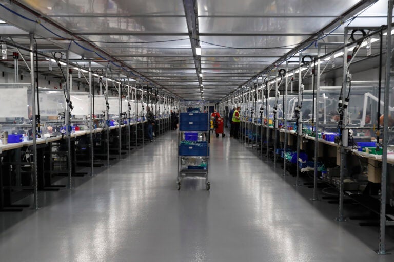 This Wednesday, May 13, 2020 file photo shows work stations in the Ford Rawsonville plant in Ypsilanti Township, Mich. (AP Photo/Carlos Osorio)