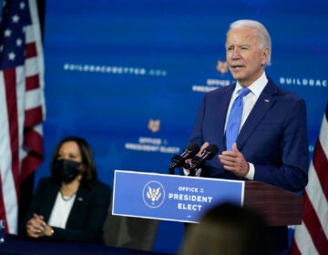 President-elect Joe Biden speaks as Vice President-elect Kamala Harris listens at left, during an event to introduce their nominees and appointees to economic policy posts at The Queen theater, Tuesday, Dec. 1, 2020, in Wilmington, Del. (AP Photo/Andrew Harnik)