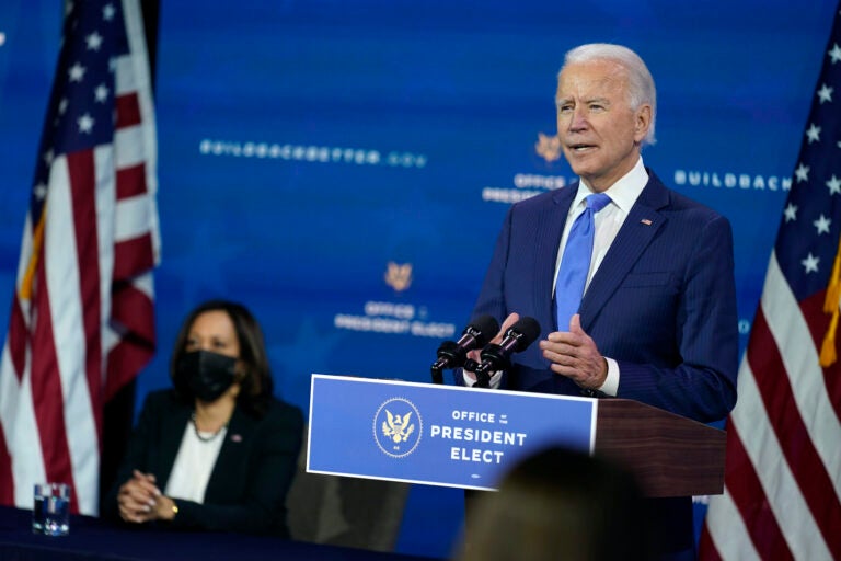 President-elect Joe Biden speaks as Vice President-elect Kamala Harris listens at left, during an event to introduce their nominees and appointees to economic policy posts at The Queen theater, Tuesday, Dec. 1, 2020, in Wilmington, Del. (AP Photo/Andrew Harnik)