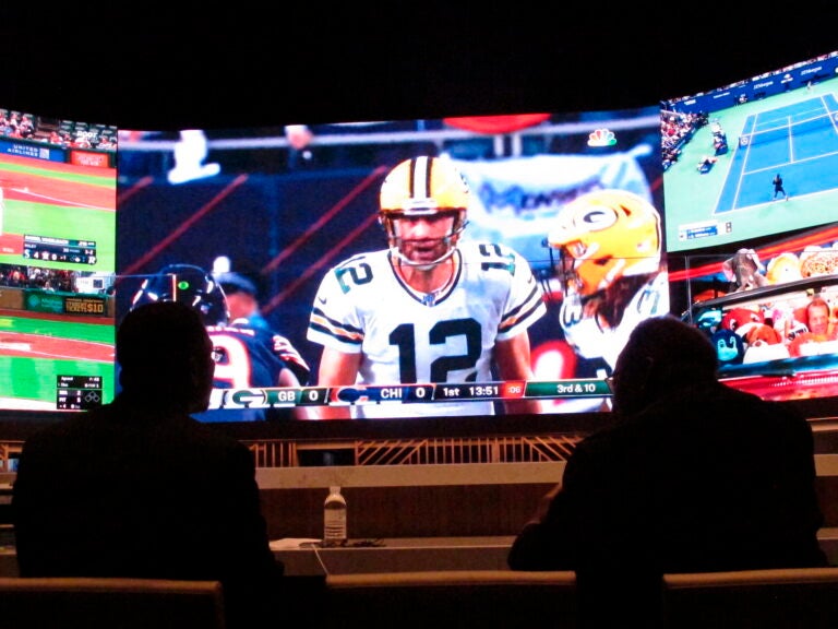 A gambler makes a sports bet at Bally's casino