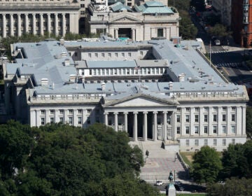 The U.S. Treasury Department building viewed from the Washington Monument, Wednesday, Sept. 18, 2019, in Washington. (AP Photo/Patrick Semansky)