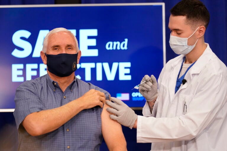 Vice President Mike Pence receives a Pfizer-BioNTech COVID-19 vaccine shot at the Eisenhower Executive Office Building on the White House complex, Friday, Dec. 18, 2020, in Washington. (AP Photo/Andrew Harnik)