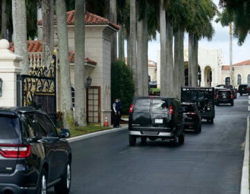 President Donald Trump’s motorcade arrives at Trump International Golf Club, Thursday, Dec. 24, 2020, in West Palm Beach, Fla. (AP Photo/Patrick Semansky)
