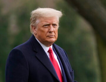 FILE - In this Dec. 12, 2020, file photo President Donald Trump walks on the South Lawn of the White House in Washington before boarding Marine One. Unemployment benefits for millions of Americans struggling to make ends meet were set to lapse at midnight Saturday night unless Trump signed an end-of-year COVID relief and spending bill that had been considered a done deal before his sudden objections. (AP Photo/Patrick Semansky, File)