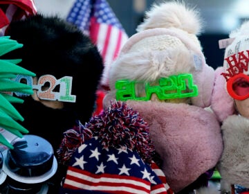 Only a few items celebrating the new year are displayed at the vendor's stall in Times Square, New York, Monday, Dec. 28, 2020. (AP Photo/Seth Wenig)